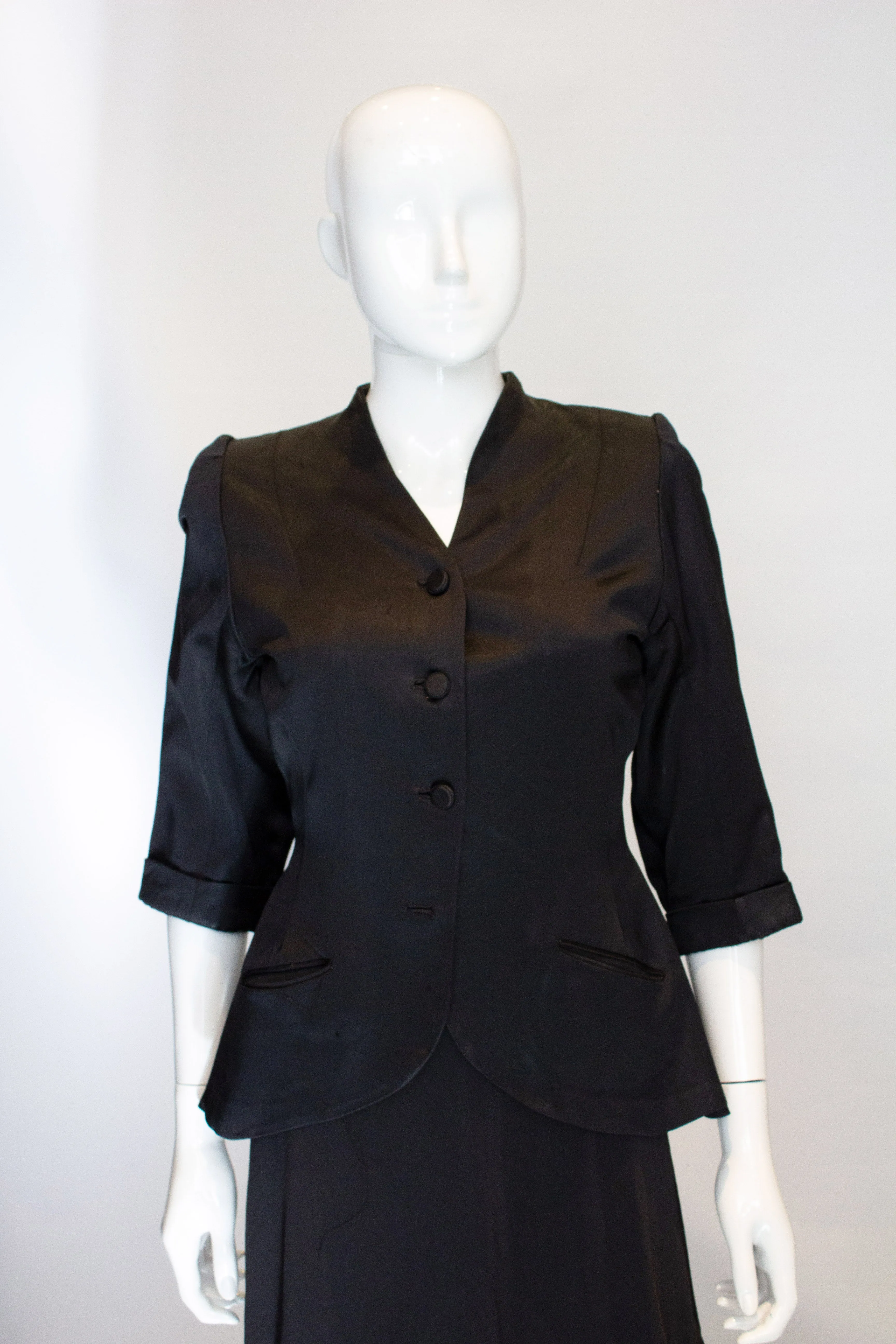 A Vintage 1940s Black Satin short sleeved Jacket