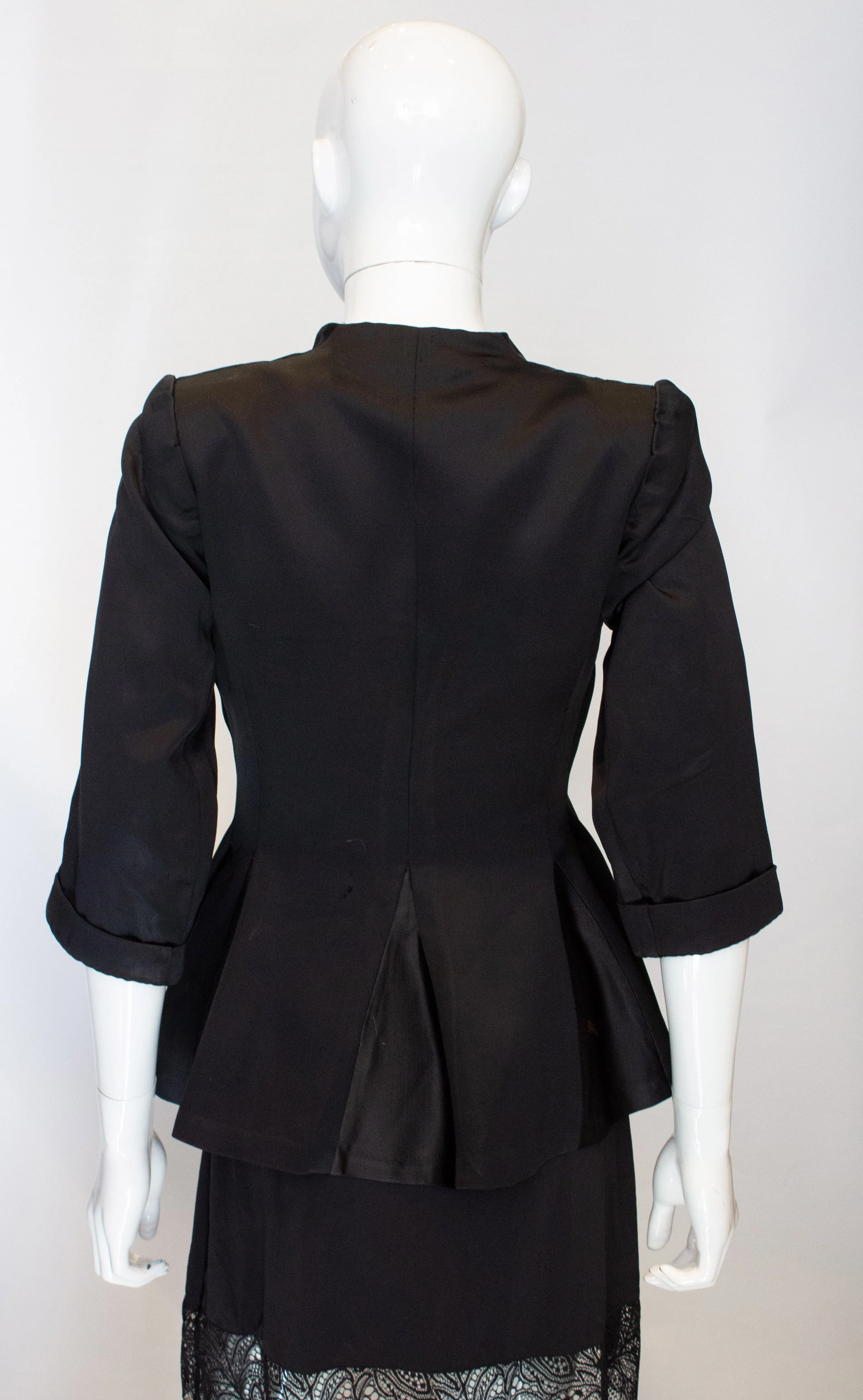 A Vintage 1940s Black Satin short sleeved Jacket