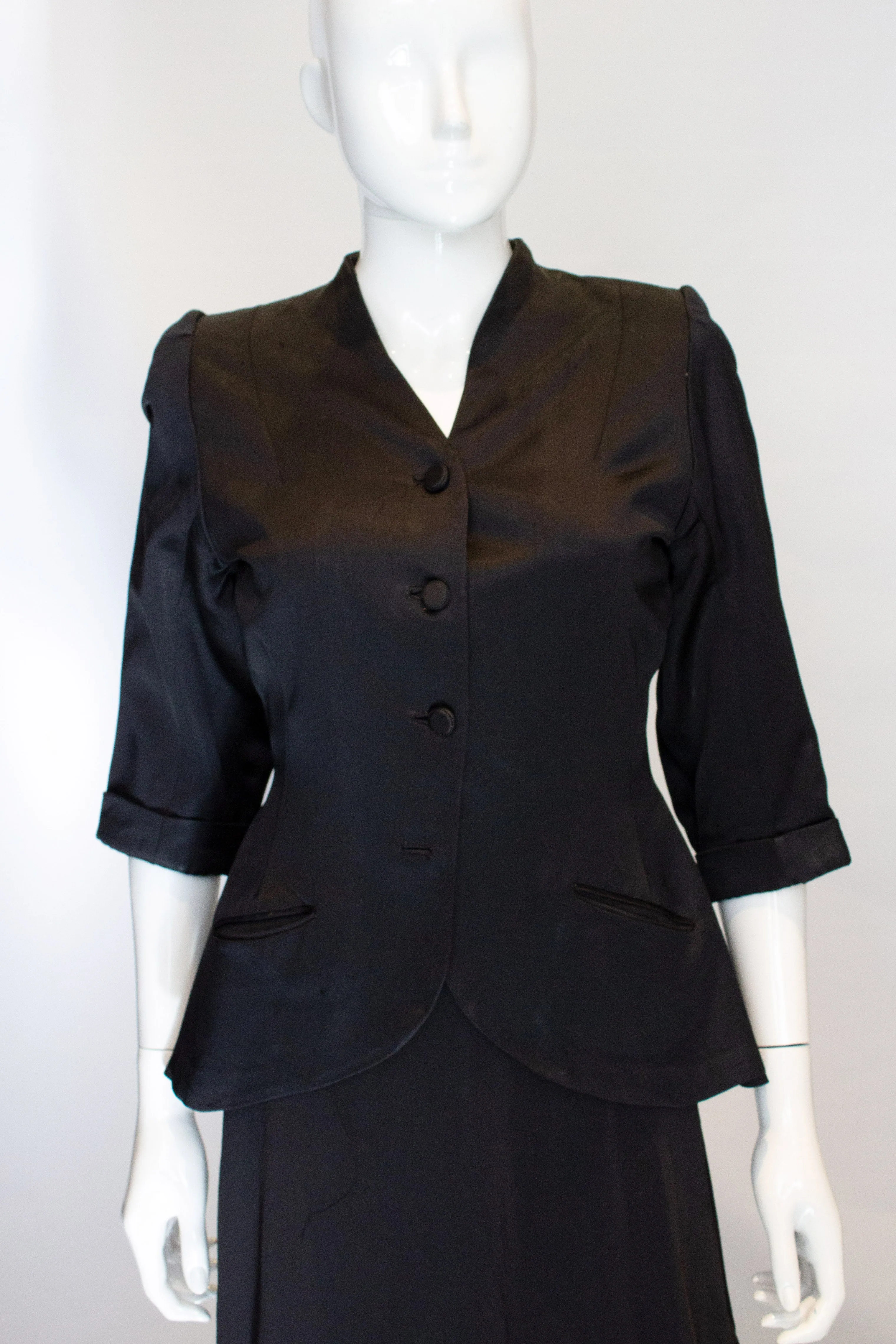 A Vintage 1940s Black Satin short sleeved Jacket